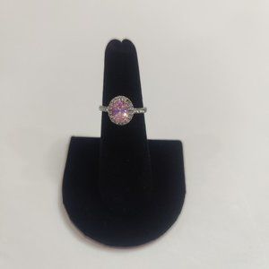 EUC silver ring with large pink center gem stones by clear gem stones